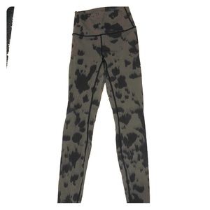 Green with black dot lulu lemon 7/8 leggings.